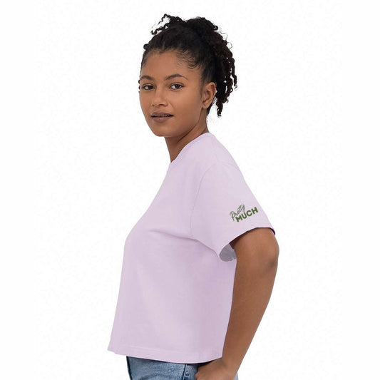 Side view of the Matcha Girl cropped tee showing the green PrettyMUCH logo on the left sleeve
