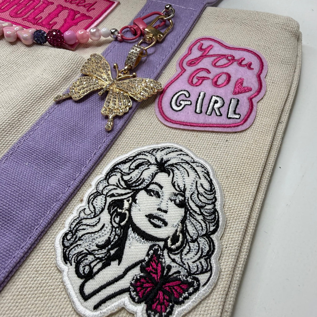 Dolly Parton You Go Girl mini tote by PrettyMUCH.