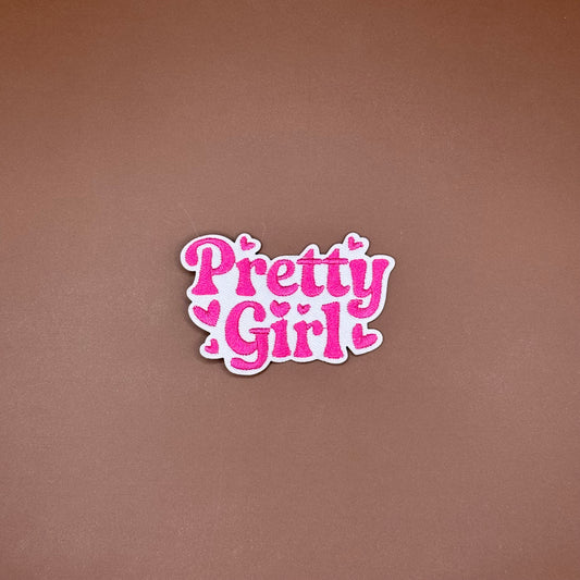 Hot pink retro Pretty Girl lettering iron-on patch scattered with small hearts