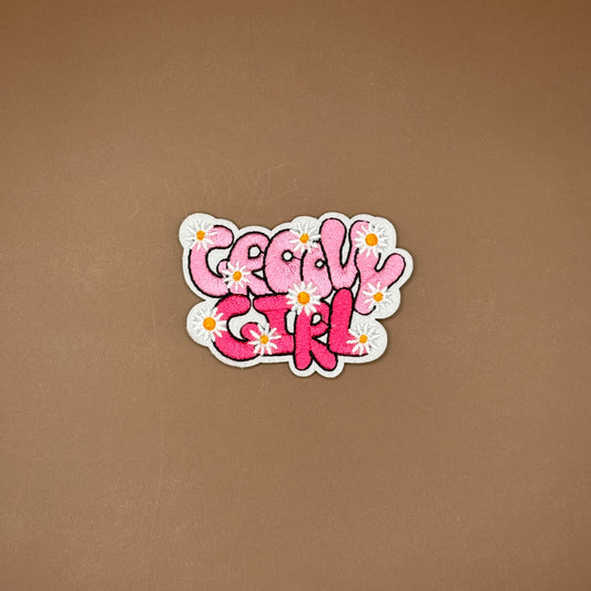 Retro iron-on patch with two-tone pink bubble letters and small white daisies