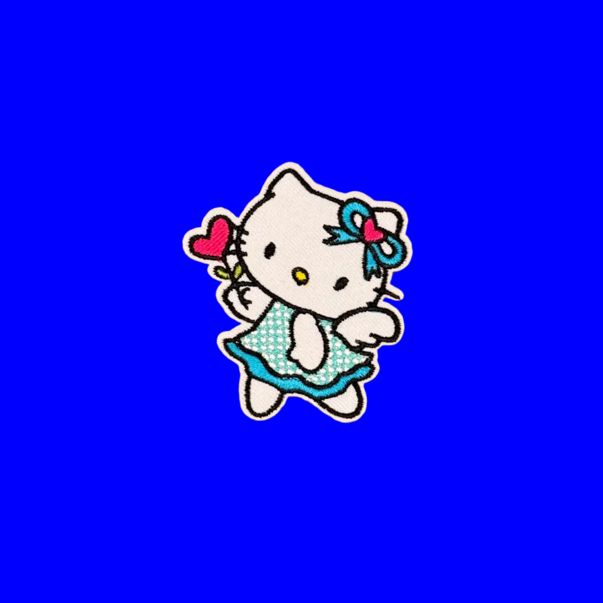 Hello Kitty in blue polka dot dress embroidered patch