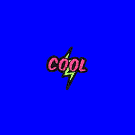 Iron-on patch with hot pink block letters on black and a neon green lightning bolt