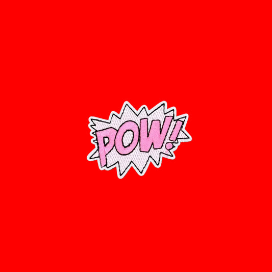 Comic book burst iron-on patch with POW in soft pink block letters