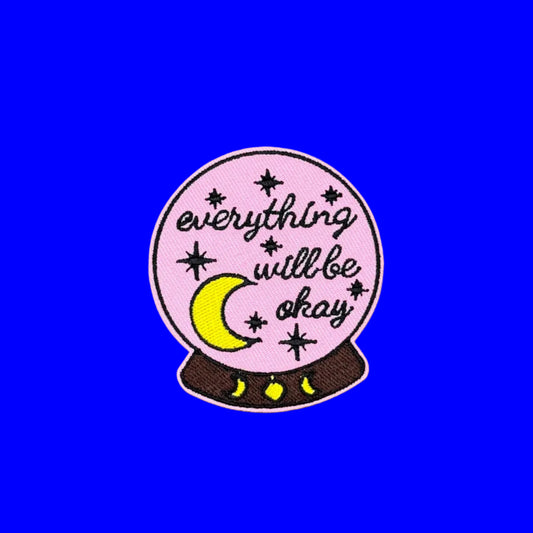Pink crystal ball iron-on patch with stars, a crescent moon and the words Everything Will Be Okay