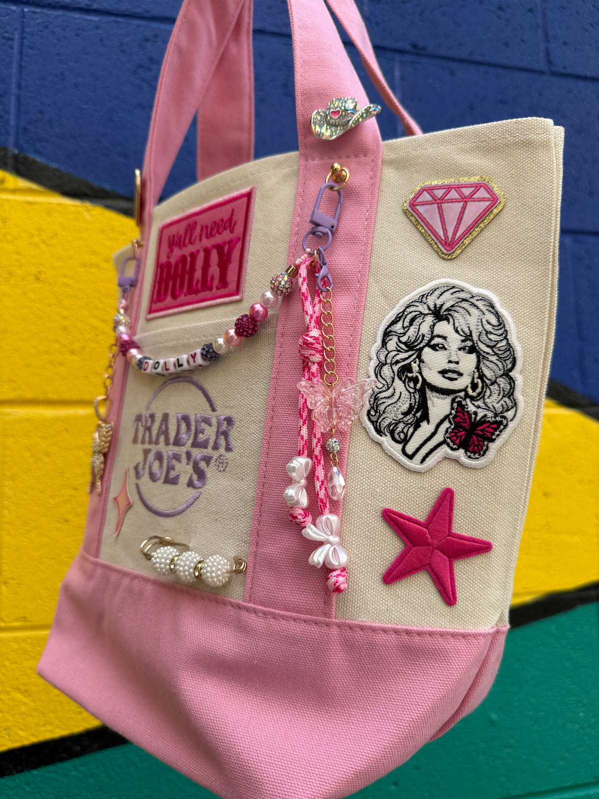 Tote bag with Dolly Parton portrait patch and Y'all Need Dolly patch