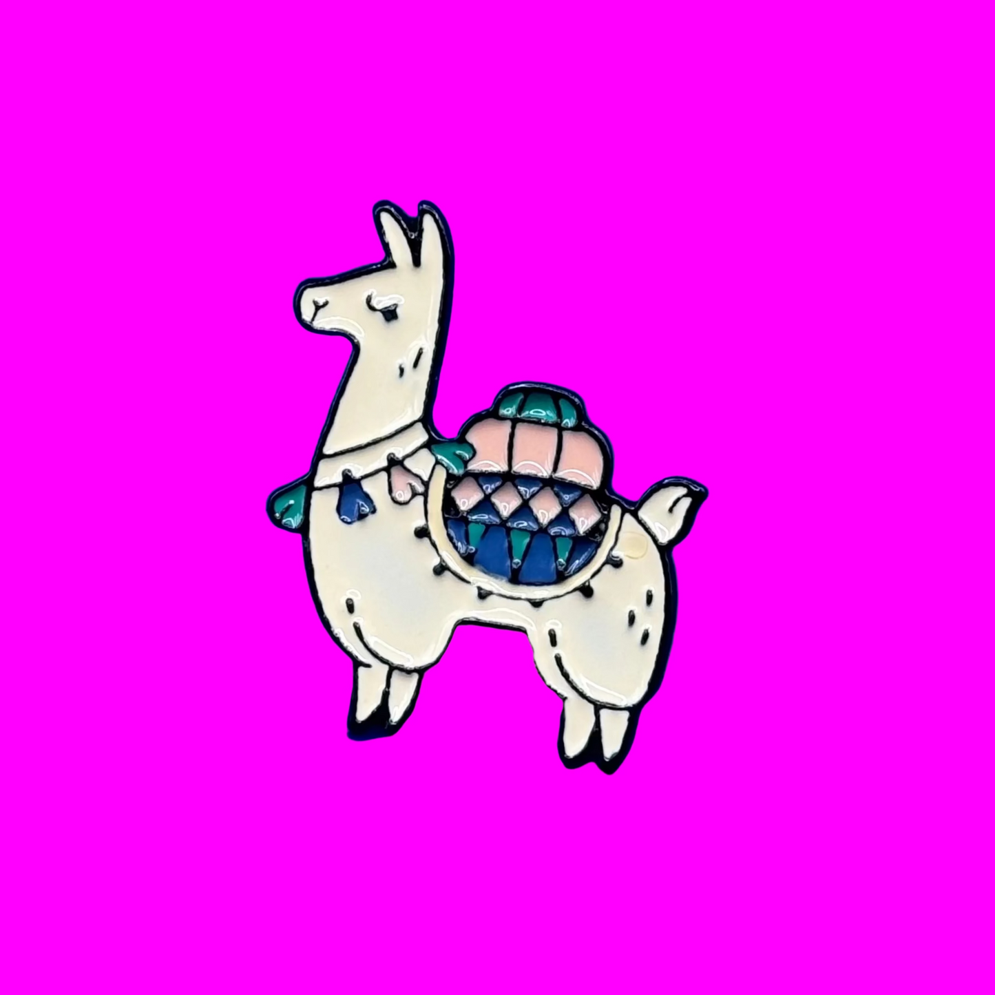 Cream llama enamel pin with sleepy eyes, tassels and a pastel saddle bag