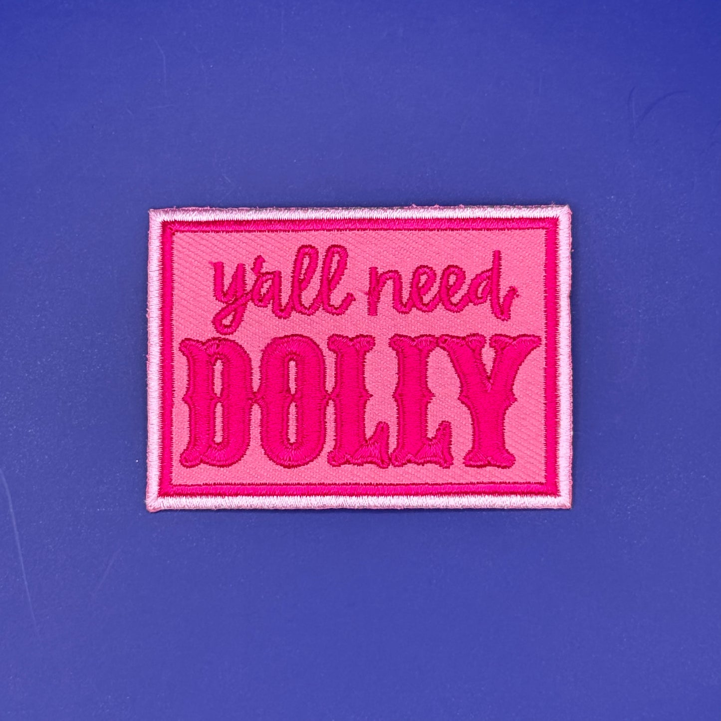 Y'all Need Dolly embroidered iron-on patch in hot pink