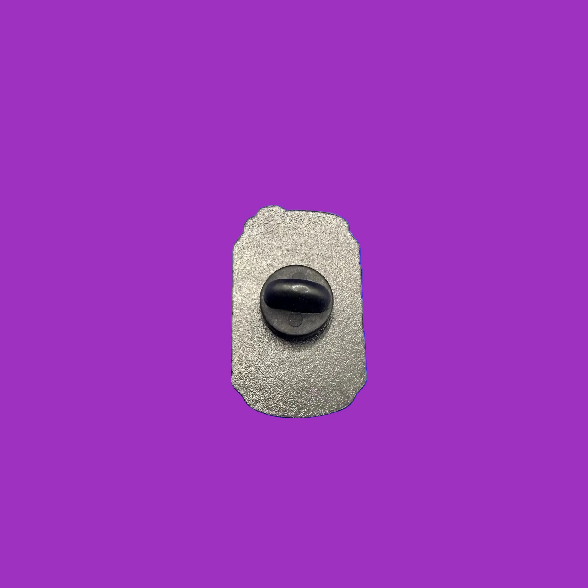 Back of the Girly Pop cherry soda can enamel pin showing the silver metal back and black rubber clutch, purple background