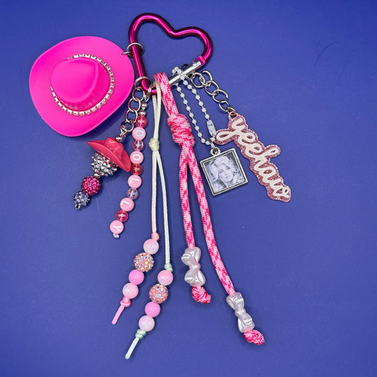 Hot pink Dolly bag charm with rhinestone cowboy hat, yeehaw charm and pearl beads