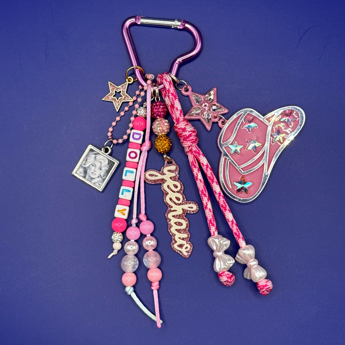 Handmade Dolly Parton bag charm with lilac carabiner, yeehaw charm and pink cowboy hat