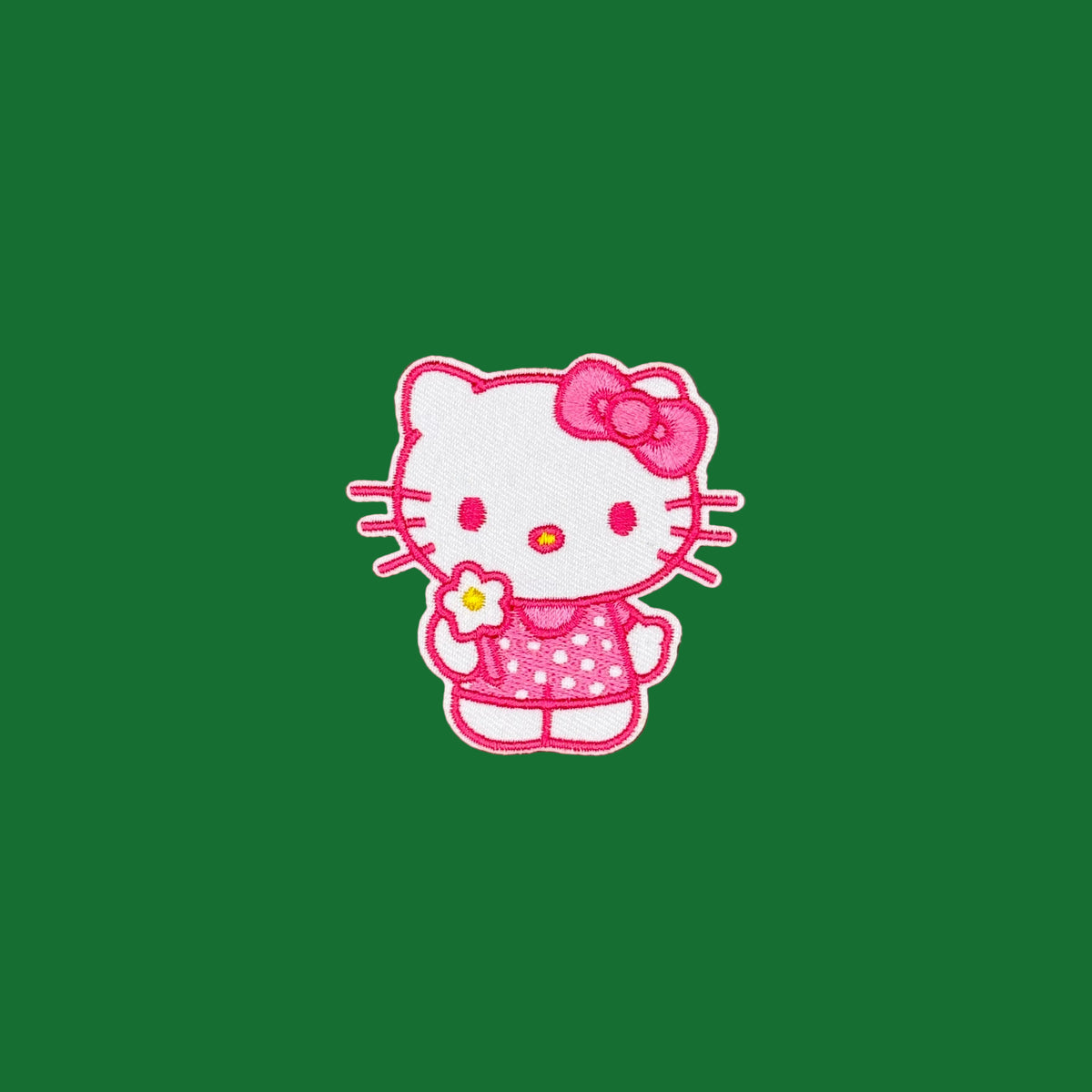 Hello Kitty in pink polka dot dress embroidered patch