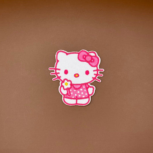 Hello Kitty in pink polka dot dress embroidered patch