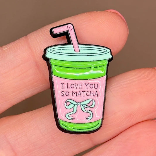 I Love You So Matcha enamel pin — pink and green iced matcha cup with bow, close-up