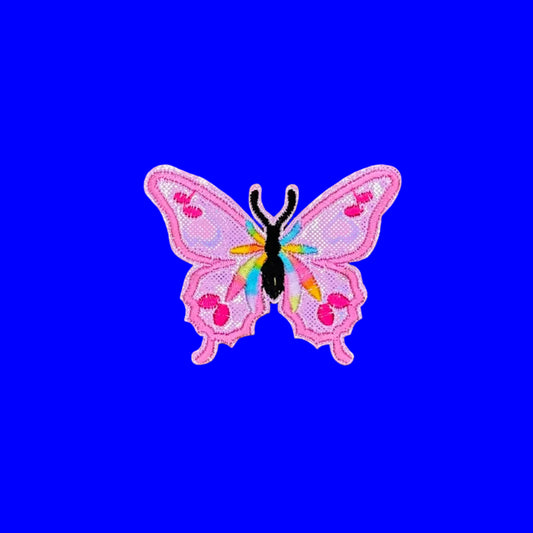 Iridescent pink butterfly iron-on patch with a rainbow body and hot pink spots