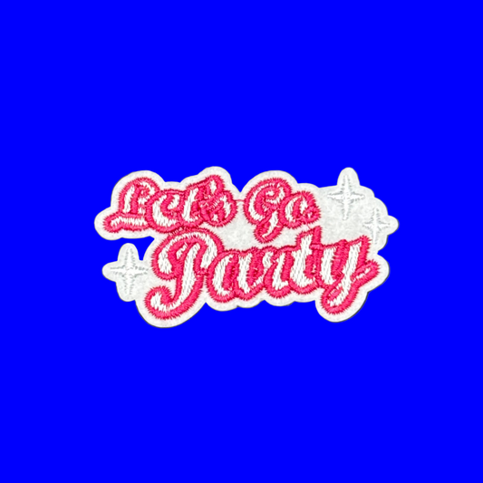 An embroidered patch with the phrase 'Let's Go Party' in bright pink script on a white background with white star accents, displayed on a solid blue surface.