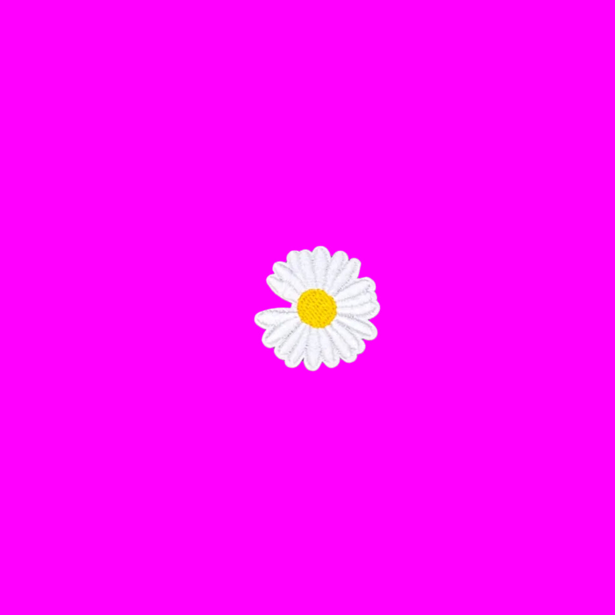 Mini white daisy embroidered iron-on patch with a yellow center