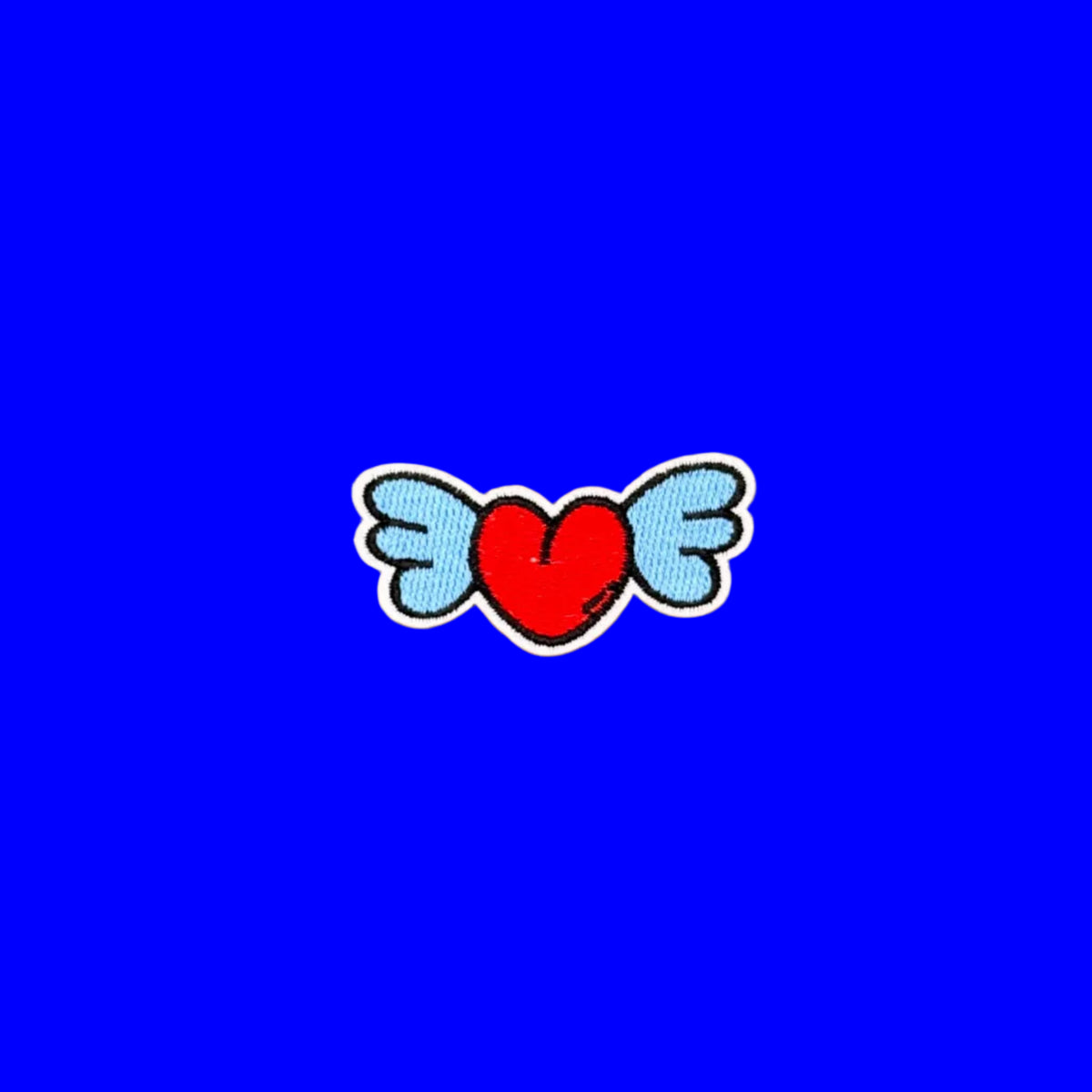 Red and blue winged heart embroidered patch