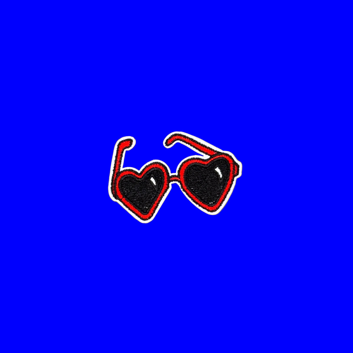 Vibrant red heart-shaped sunglasses embroidered patch.