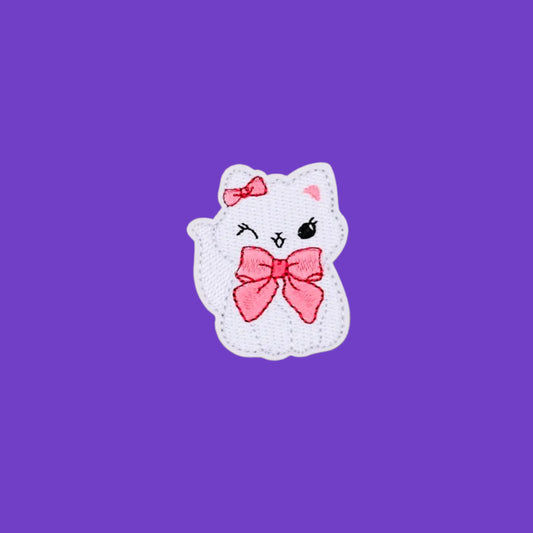 Winking coquette kitten with bow embroidered patch